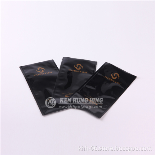High Quality Black Printed 3 side seal pouch Aluminum Foil cosmetic packaging bag